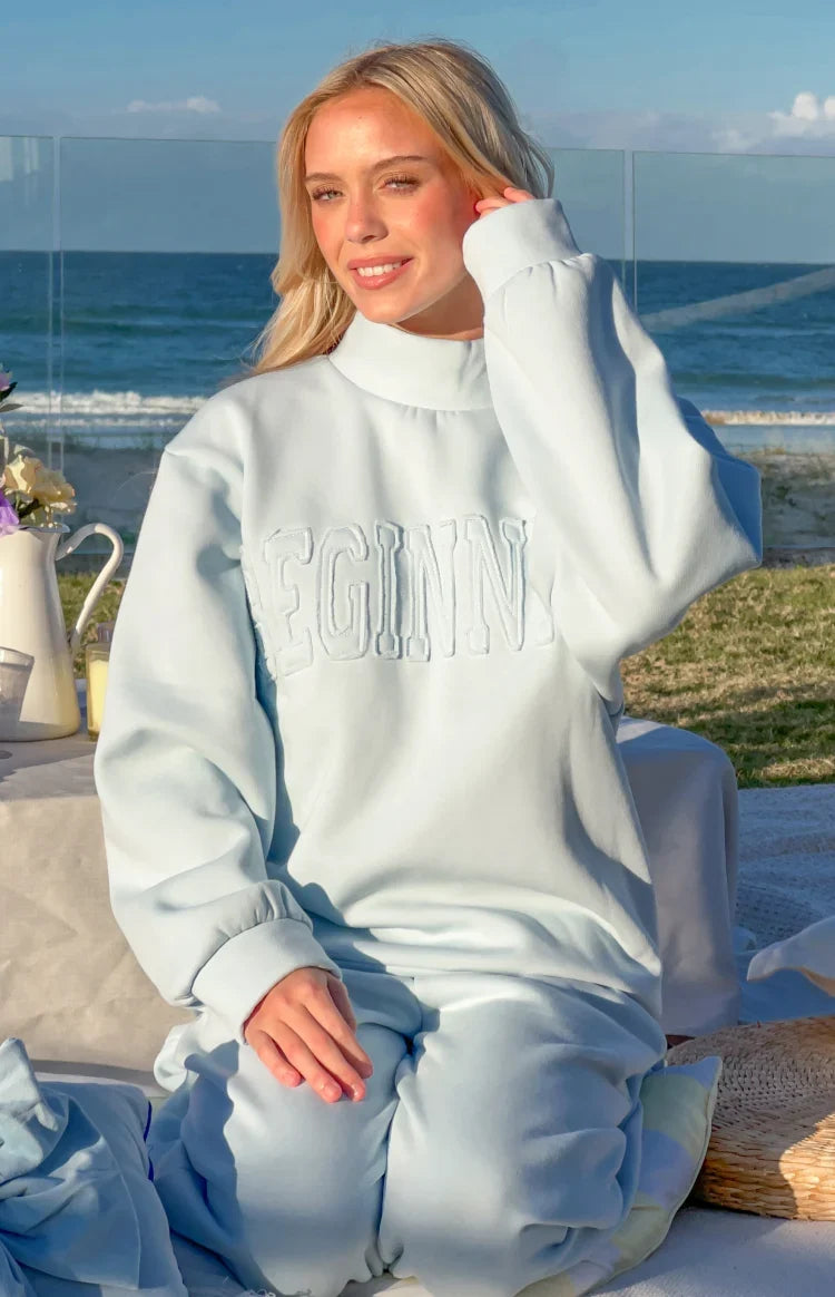 Remy Blue Applique Mock Neck Sweater