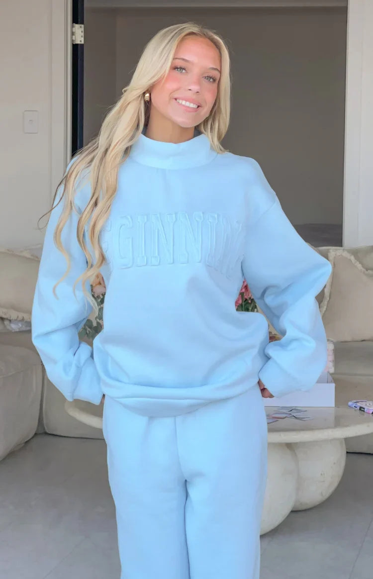 Remy Blue Applique Mock Neck Sweater