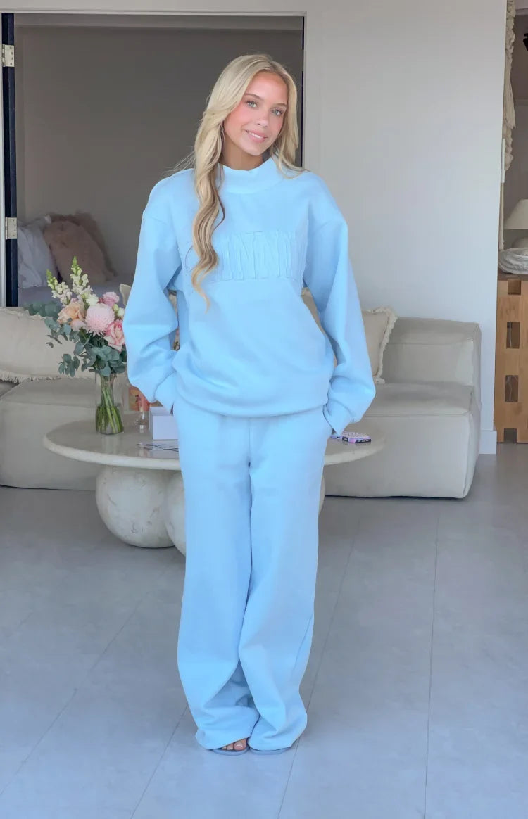 Remy Blue Applique Mock Neck Sweater
