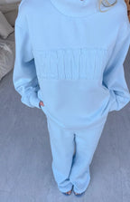 Remy Blue Applique Mock Neck Sweater